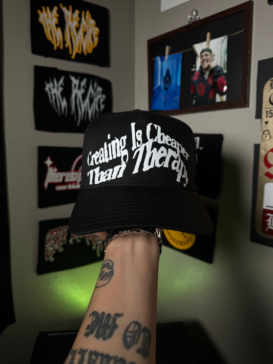 “Creating Is Cheaper Than Therapy” Hats
